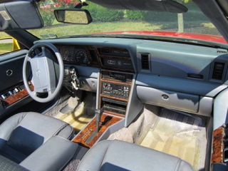 Illustration for article titled For $1,000, This 1989 Chrysler LeBaron Will Let You Clown Around